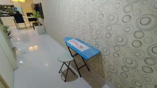 Best Location and Tidy 2BR Apartment at Trillium Residence By Travelio - 1