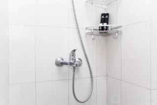 Homey and Tidy Studio Monroe Tower Apartment By Travelio - Cikarang - 0