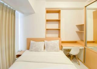 Tidy and Comfortable 2BR Tokyo Riverside PIK 2 Apartment By Travelio - Rawalembang - 7