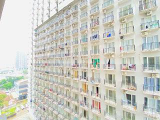 Comfy Studio Room at Grand Asia Afrika Apartment By Travelio - 7