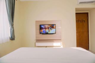 Comfortable and Modern 2BR at Grand Palace Kemayoran Apartment By Travelio - 1