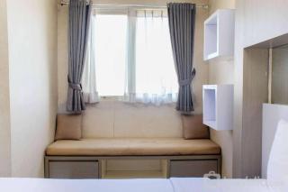 Homey and Tidy Studio at The Oasis Apartment By Travelio - Bekasi - 9