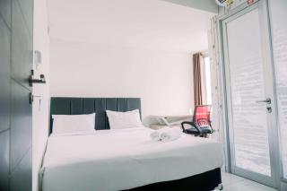 Homey and Warm 1BR at Sentraland Cengkareng Apartment By Travelio - Jakarta - 8