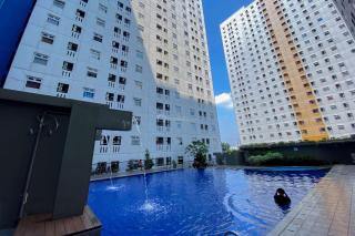 Modern and Homey 2BR at Green Pramuka City Apartment By Travelio - 9