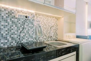 Simply Look Studio Room Akasa Pure Living BSD Apartment By Travelio - Tangerang - 2