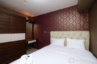 Cozy Living and Modern 2BR Bassura City Apartment By Travelio - 0