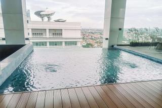 Homey and Comfortable 1BR at The Smith Alam Sutera Apartment By Travelio - 5