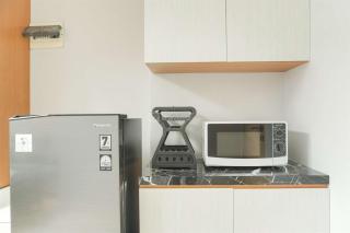 Studio Loft No Kitchen Mezzanine at Kubikahomy Apartment By Travelio - Tangerang - 2