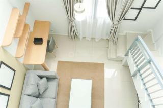 Studio Loft No Kitchen Mezzanine at Kubikahomy Apartment By Travelio - Tangerang - 1
