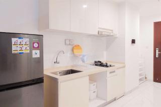 Comfort Living 2BR at Sky House BSD Apartment By Travelio - 6