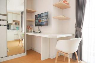 Comfort and Enjoy Living Studio Casa de Parco Apartment By Travelio - Tangerang - 2