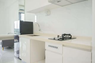 Fully Furnished with Modern Design 2BR at Sky House BSD Apartment By Travelio - 0