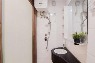 Comfy and Homey Studio at Sky House BSD Apartment By Travelio - 2