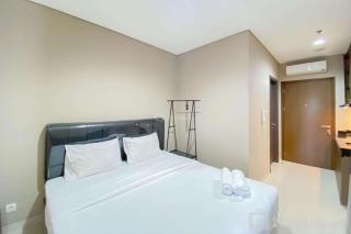Cozy and Minimalist Studio Room Ciputra International Apartment By Travelio - 0