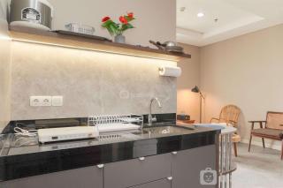 Good Deal and Restful 1BR Ciputra International Apartment By Travelio - 8