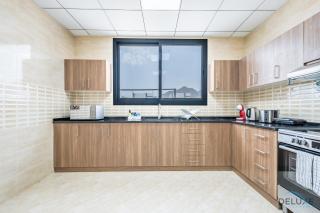 Getaway Deal 3BR with Outdoor Jacuzzi plus Scenic Views by Deluxe Holiday Homes - Fujaira - 8