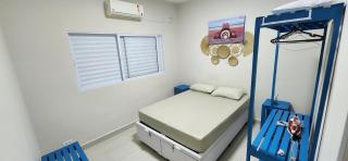 Refúgio Vieira casa com Ar cond churrasqueira piscina aquecida taxa a parte em praia Grande - 2