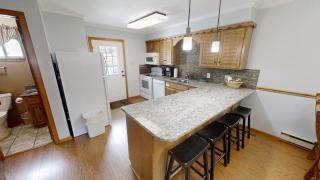 Claim Jumper Townhouse 01 - On the River - Across from the Fishing Ponds - WiFi - Cable - Near Ski Area - Wood Burning Fireplace - 1