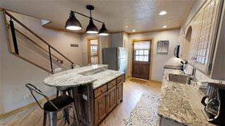 Claim Jumper Townhouse 03 - On the River - Across from the Fishing Ponds - WiFi - Cable - Near Ski Area - Wood Burning Fireplace - Red River - 5