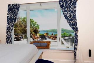 Hot Tub While Taking In Lake Front View - 4