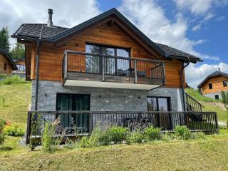 Tomtegl-Bergchalet 2 mit Privatsauna, beheiztem Infinitypool, Kamin, Fitnessraum, auf 1500m Seehöhe - Hochrindl - 9