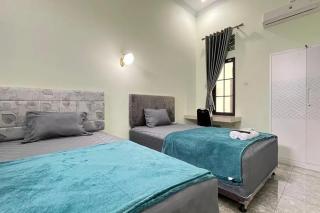 Trubus Guesthouse Syariah Magelang mitra RedDoorz - 3