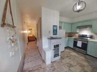 Valley Condo 108 - Skye Retreat - Creekside - Pet Friendly - WiFi - Hot Tub - Fireplace - Washer - Dryer - Playground - Red River - 1