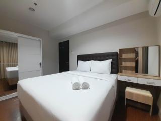 Elegant and Spacious 1BR at Patraland Amarta Apartment By Travelio - Beran-kidul - 0