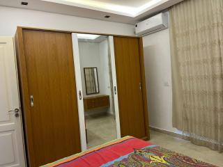 Stylish 2-Bedroom Apartment in Celia Compound, New Administrative Capital - Madīnat al Amal - 4