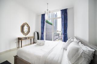 Elegant Escapes - Homely 1B in Dunya Tower - Dubai - 9