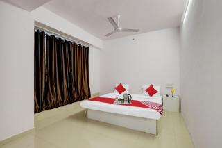 Hotel O Cozy Rooms - Surat - 4