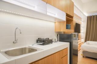 Homey Living Studio Room at Tokyo Riverside PIK 2 Apartment By Travelio - Rawalembang - 2