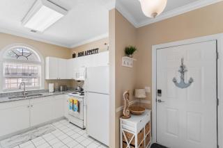 Serene Getaway Balcony Oasis with Pool & Golf Course Views by myBeach Vacation Rentals - 2