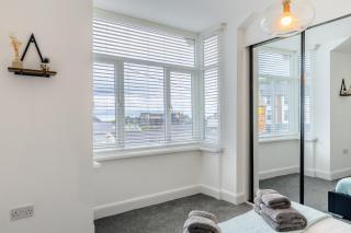 Beach Haven, Steps to Sand, Trails & Shops, Highly Rated 2-Bedroom House Minutes from Mumbles Beach with a Patio - Oystermouth - 1