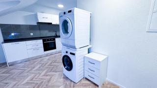 Gray apartment by freihofapartments - 8