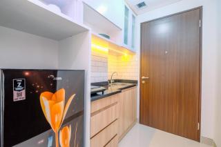 Cozy Living and Homey Studio Transpark Cibubur Apartment By Travelio - 4