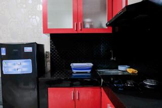 Tranquil Designed 2BR at Gateway Ahmad Yani Cicadas Apartment By Travelio - Bandung - 1