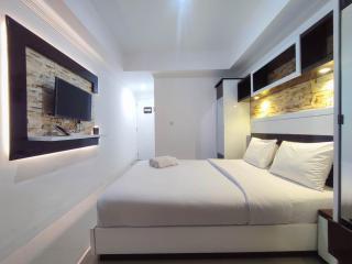 Simple and Homey Studio Room at Paltrow City Apartment By Travelio - Semarang - 7