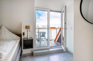 Die Zimmerei 3, zentrale Lage, Dachgeschoss mit Balkon und Klimaanlage! - Greetsiel - 2