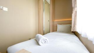 Comfort and Cozy Living 2BR Apartment at Transpark Cibubur By Travelio - Depok - 6