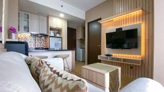 Comfort and Cozy Living 2BR Apartment at Transpark Cibubur By Travelio - Depok - 2