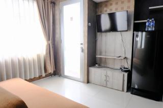 Homey and Cozy 2BR at Jarrdin Cihampelas Apartment By Travelio - Bandung - 4