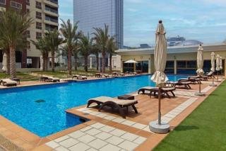 Manzil - 2BR Home with Waterfront Views in Palm - Dubái - 0