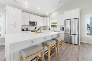 Coastal Chaos 303 Sand Piper Ln, home - Holden Beach - 1