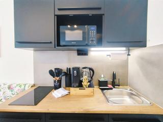 Design-Apartmenthaus für bis zu 12, modern, Dachterrasse, Grill, ruhige Lage, Disney plus, Wii, LAN und WLAN - 1