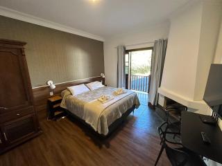 Cama Queen com arrumação diária - Campos do Jordão - 9