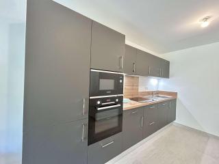 Appartement Neuf 3 Pièces avec Terrasse et Jardin, Proche Remontées Mécaniques, Parking Inclus - FR-1-597-179 - Combloux - 5