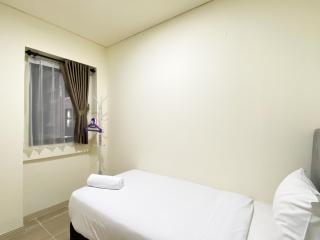 Cozy Living and Strategic 2BR at Meikarta Apartment By Travelio - Bekasi - 6