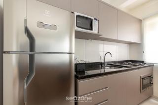 Apto moderno com churrasq. a 600m da praia COM305 - 7