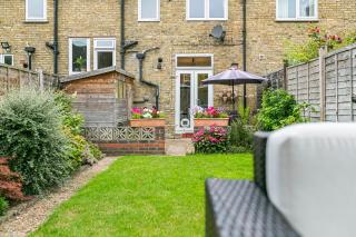 Charming 2BR Family Home with Private Garden - 3